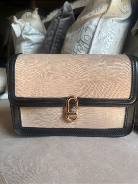 Refined Beige and Black Crossbody Bag with Gold Clasp
